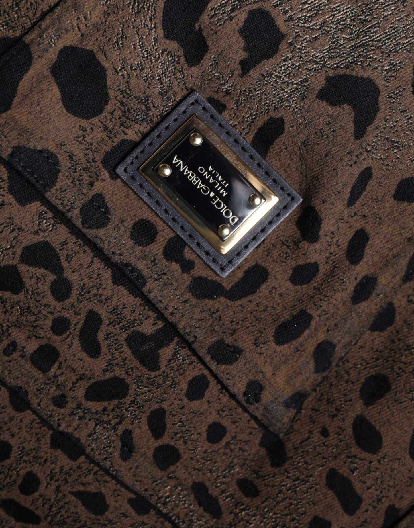Vaqueros ajustados de algodón con estampado de leopardo marrón