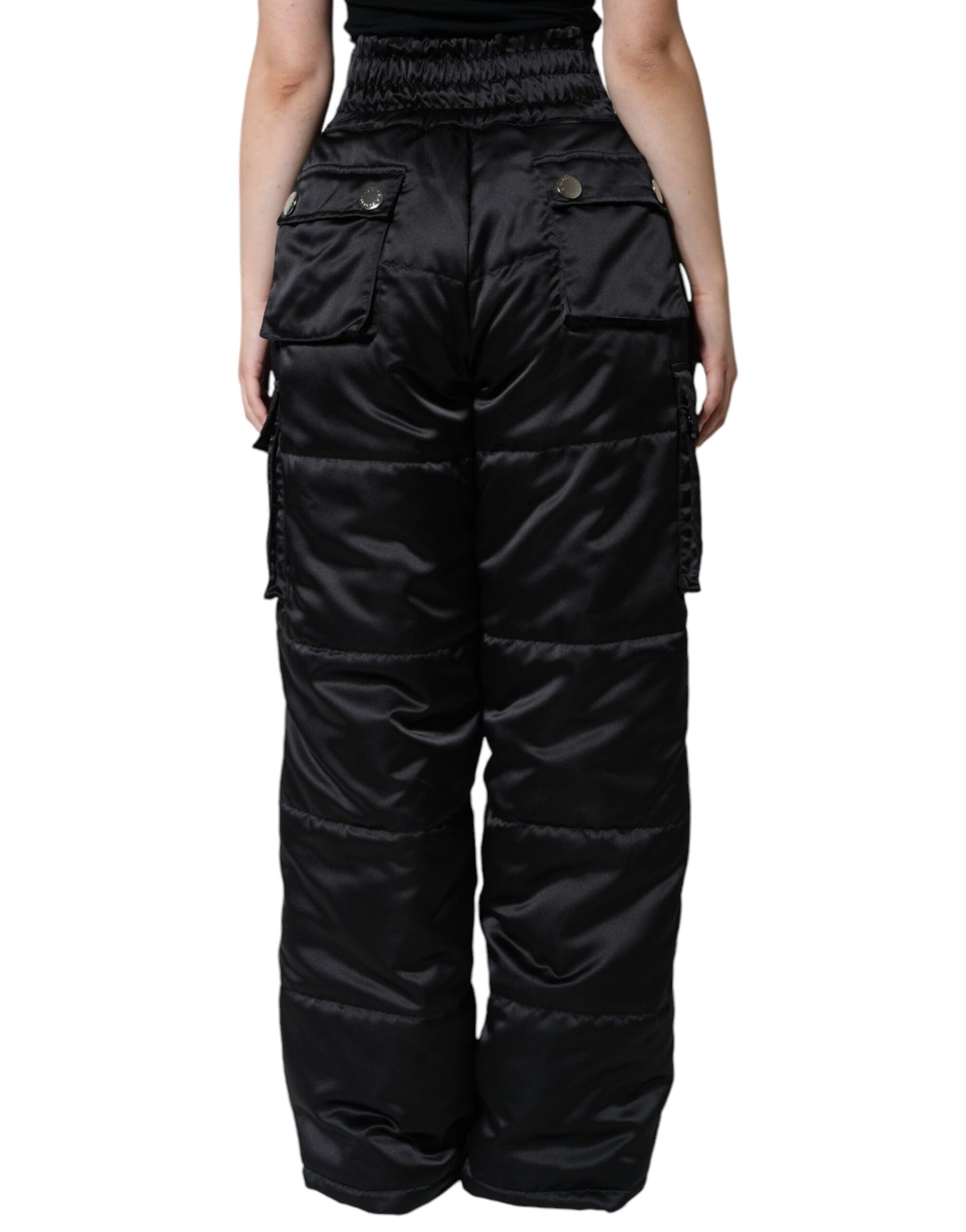 Pantalones negros acolchados de cintura alta para mujer con corte de bota