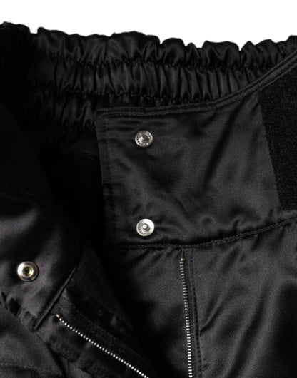 Pantalones negros acolchados de cintura alta para mujer con corte de bota