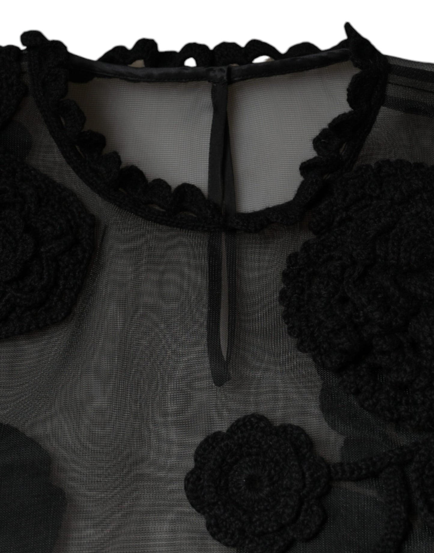 Blusa floral transparente de malla de nailon negra