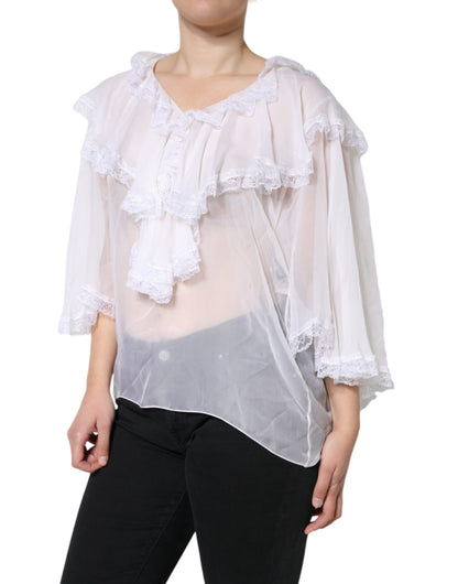 Blusa de manga larga con encaje y volantes blancos