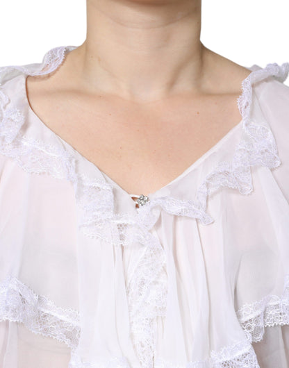 Blusa de manga larga con encaje y volantes blancos