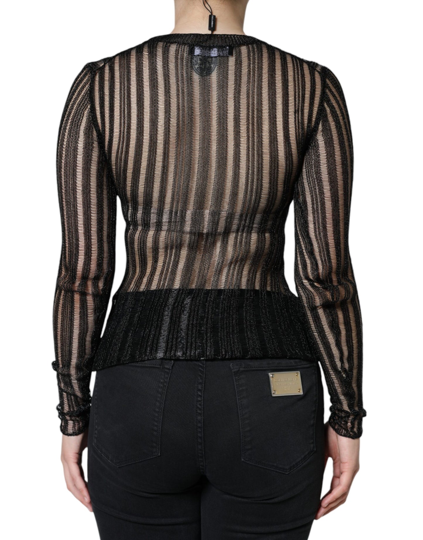 Top de manga larga transparente con rayas negras