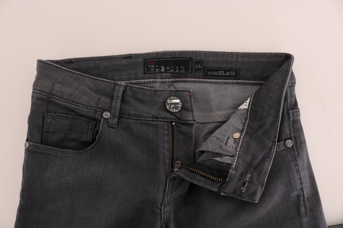 Vaqueros de diseño ajustados y elegantes de color gris