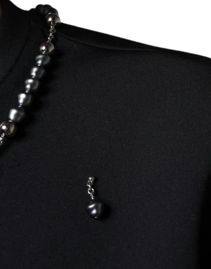 Camiseta negra de poliéster con collar adornado