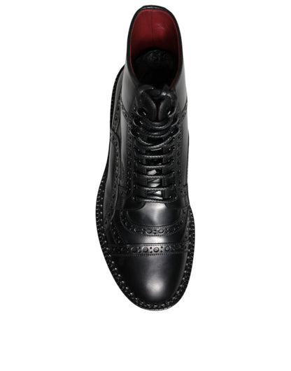 Botas de media pantorrilla con cordones de cuero negro