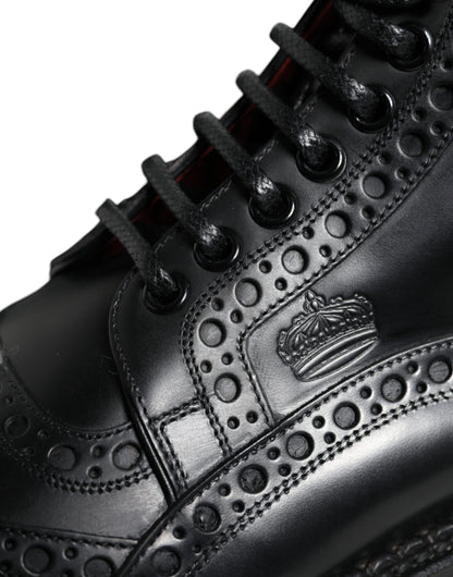 Botas de media pantorrilla con cordones de cuero negro