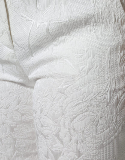 Pantalones cortos de algodón con brocado floral blanco