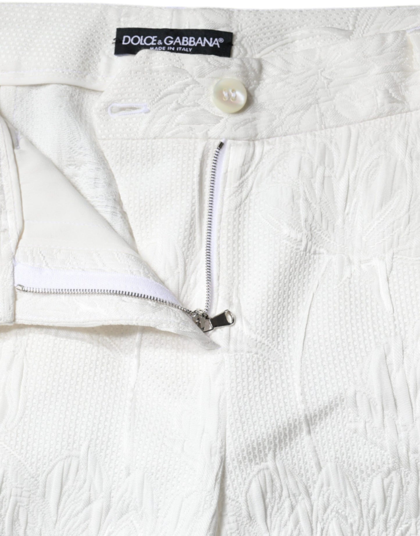 Pantalones cortos de algodón con brocado floral blanco