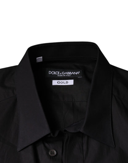 Camisa de vestir negra con bordado de corona de rey dorada