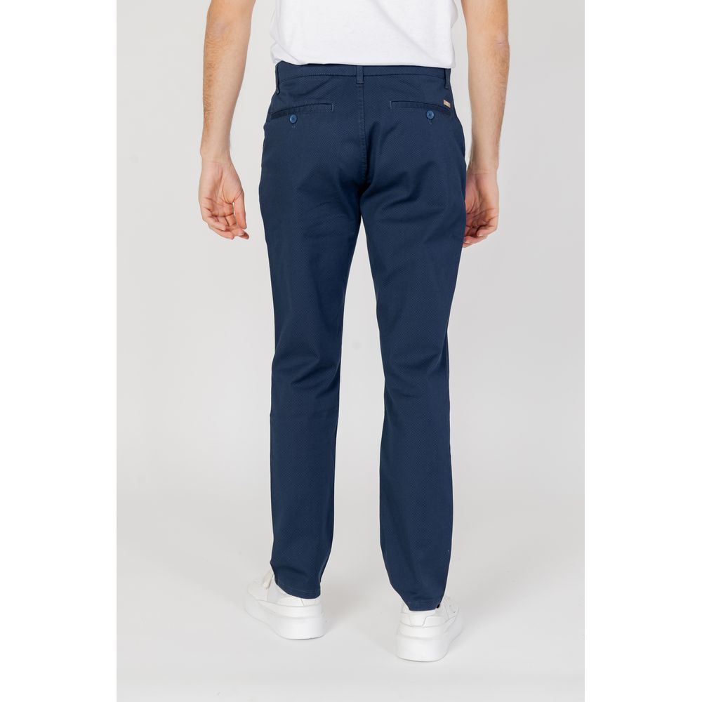 Vaqueros y pantalones de algodón azul