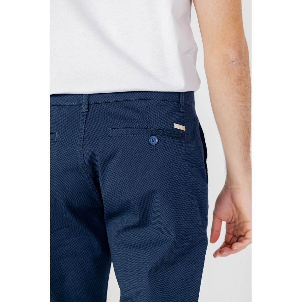 Vaqueros y pantalones de algodón azul