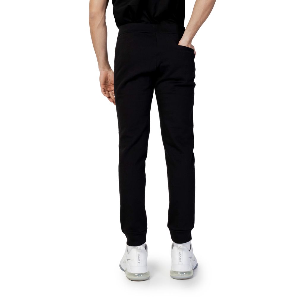 Vaqueros y pantalones de algodón negro
