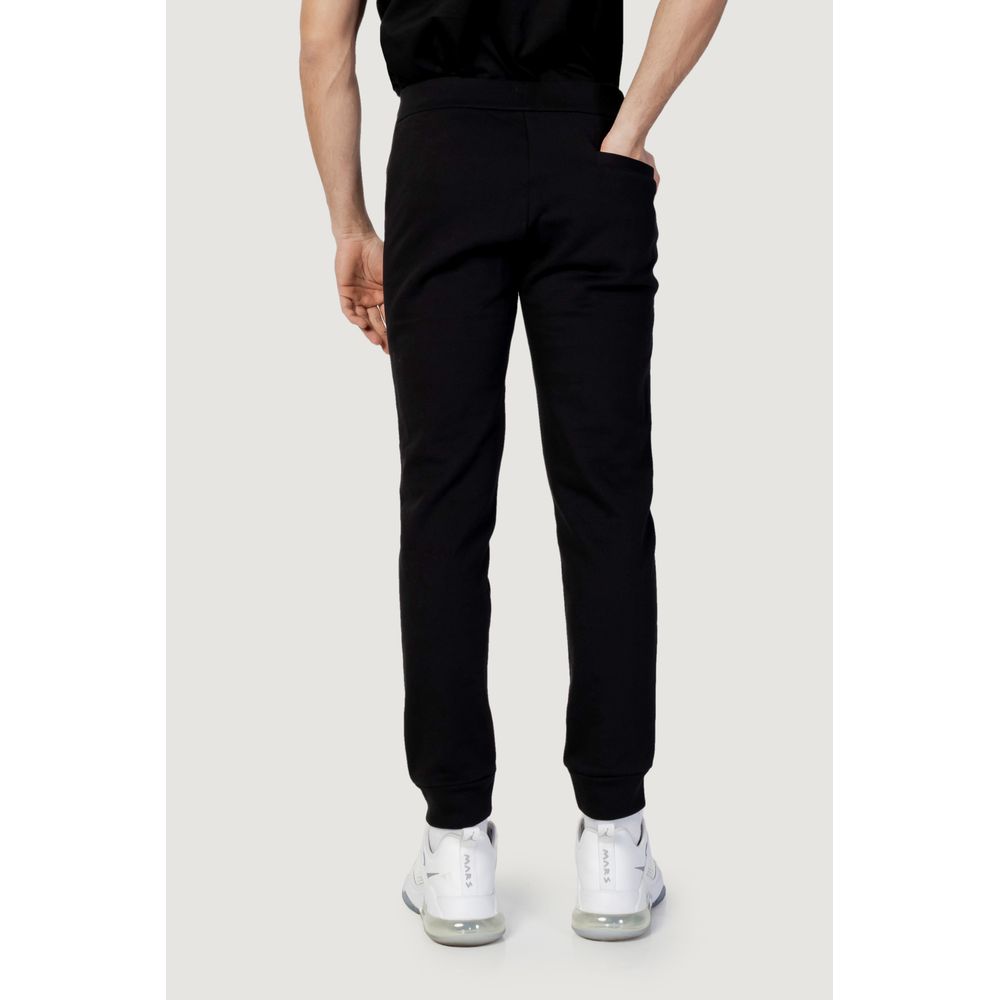Vaqueros y pantalones de algodón negro