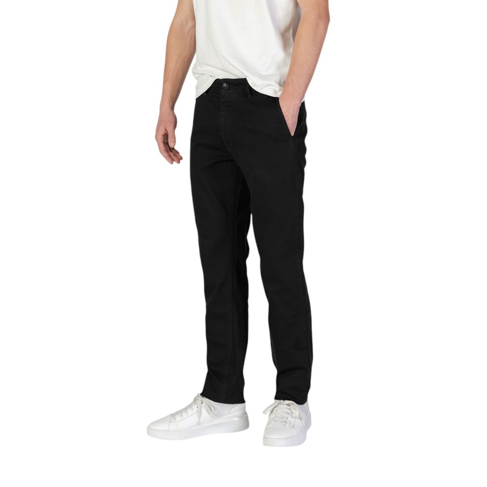 Vaqueros y pantalones de algodón negro