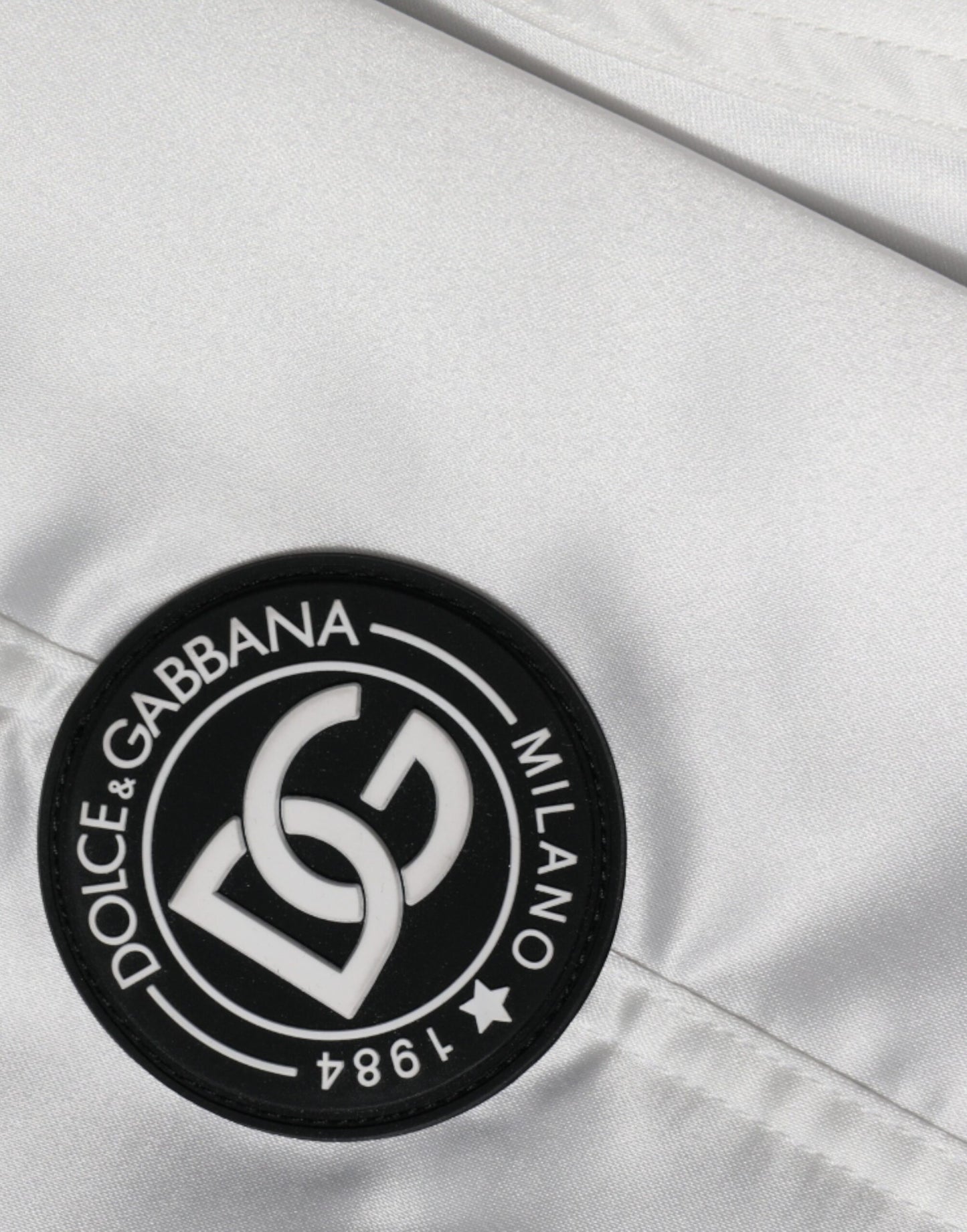 Chaqueta bomber de poliéster blanco con cremallera completa y logotipo