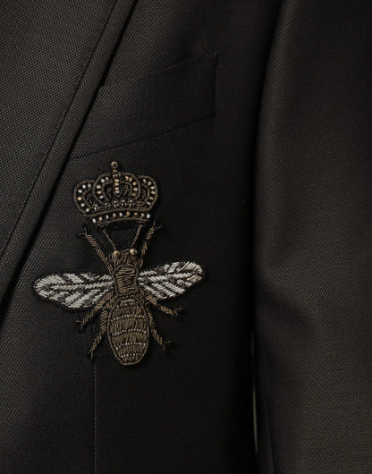 Blazer formal de lana de abeja negra con botonadura sencilla