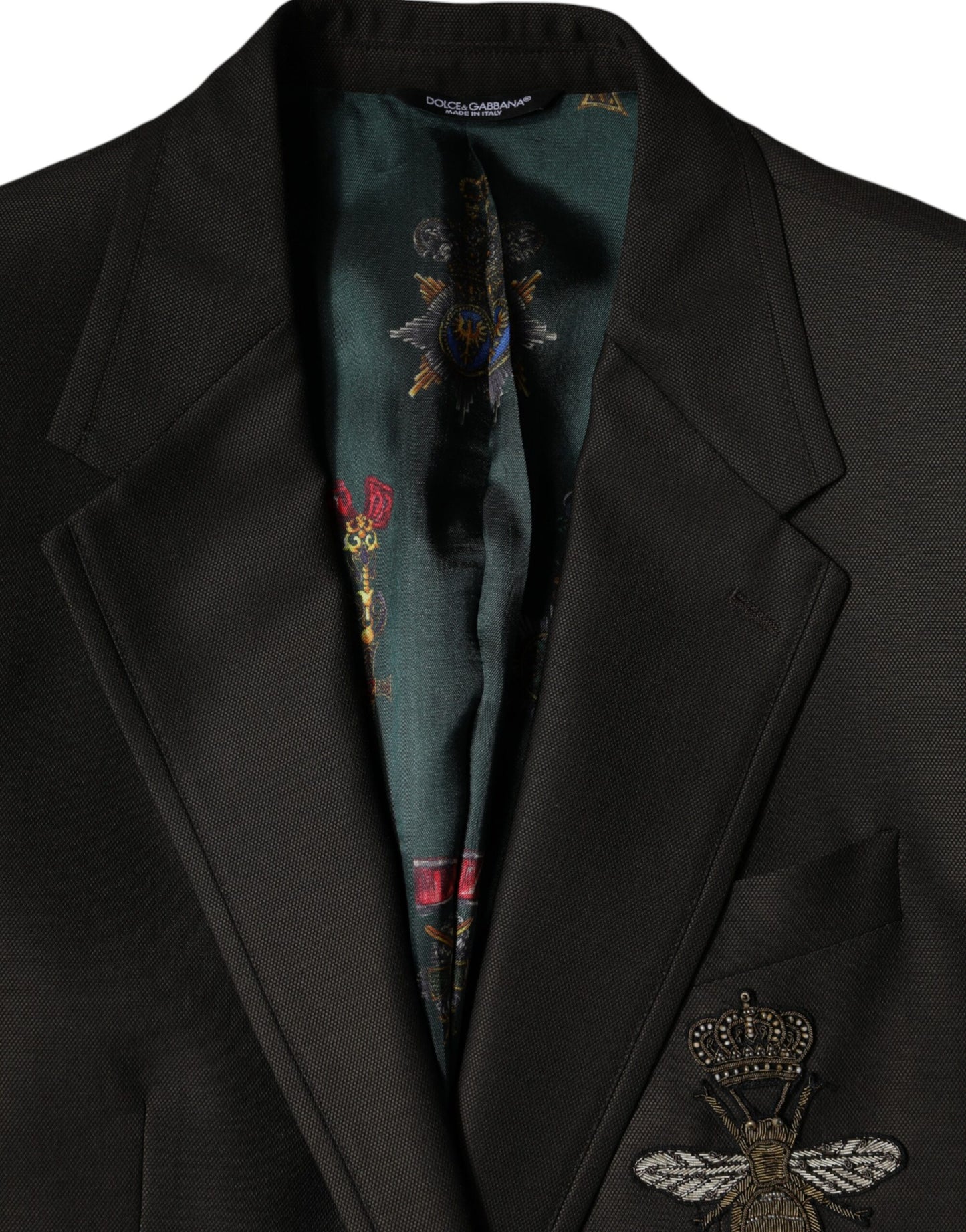 Blazer formal de lana de abeja negra con botonadura sencilla