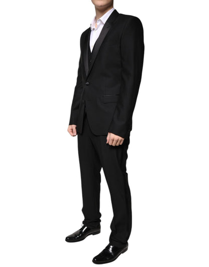 Traje formal de tres piezas de lana negra de corte entallado