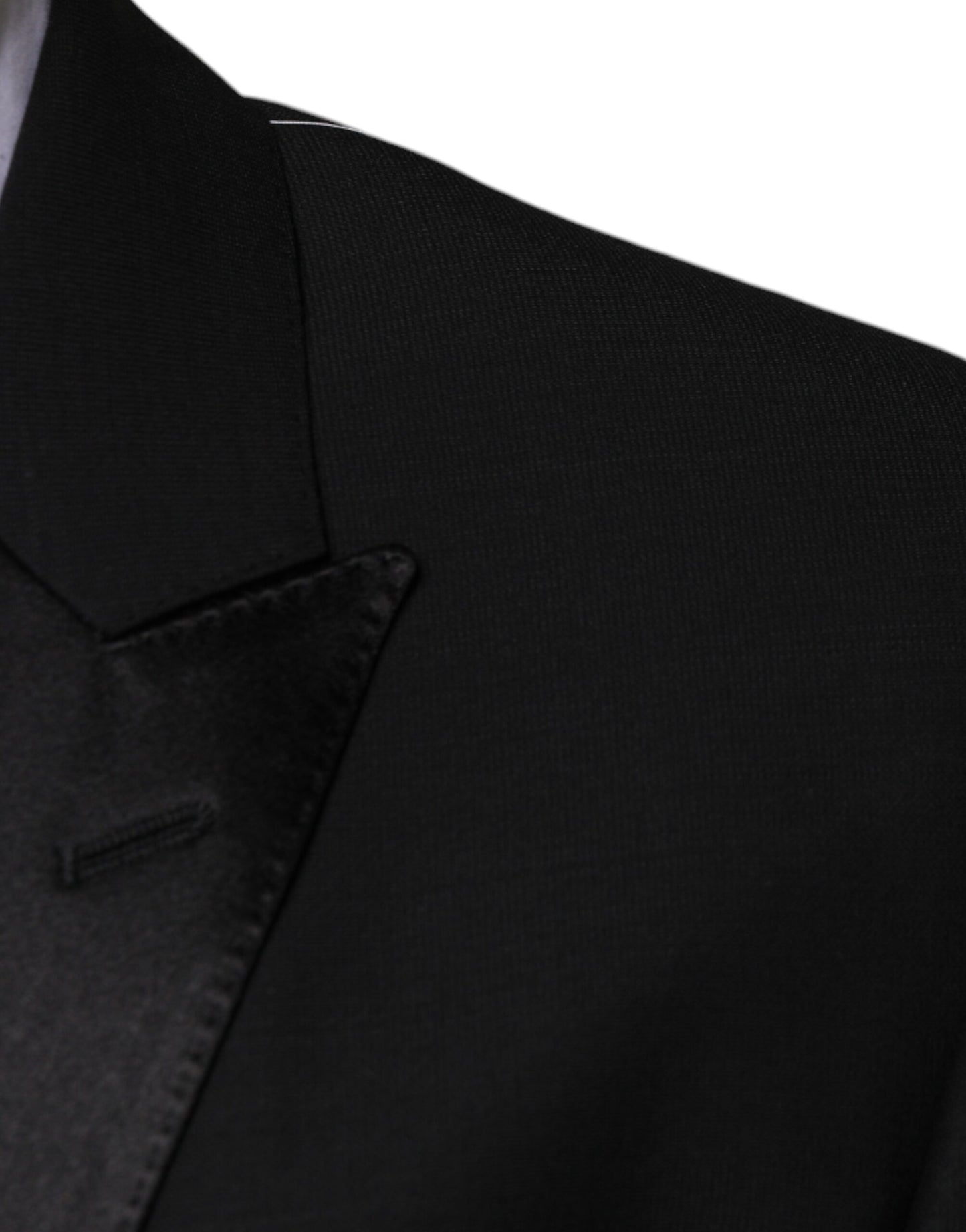 Traje formal de tres piezas de lana negra de corte entallado