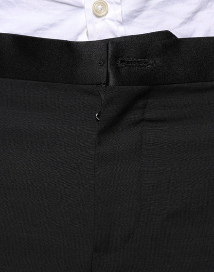 Traje formal de tres piezas de lana negra de corte entallado