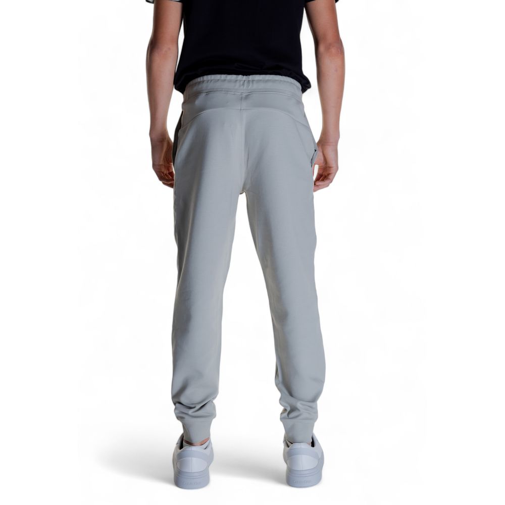 Vaqueros y pantalones de algodón gris