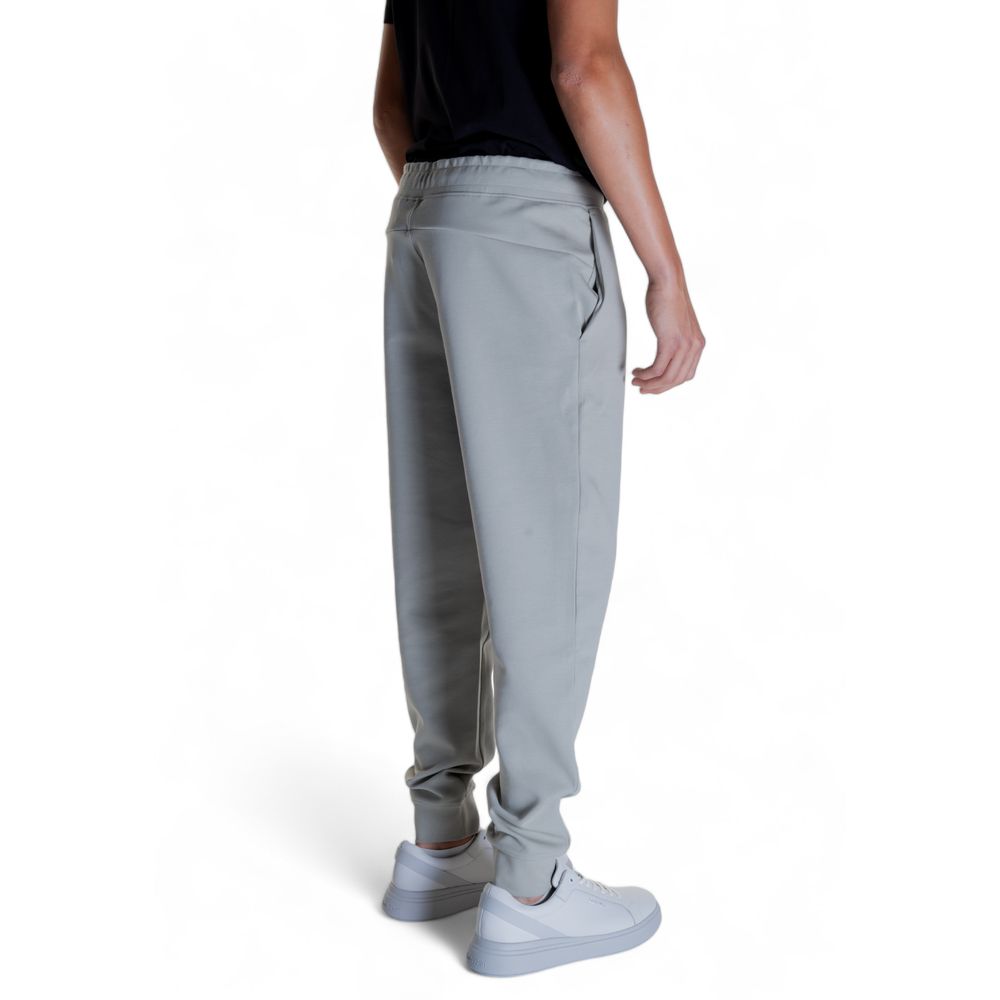 Vaqueros y pantalones de algodón gris