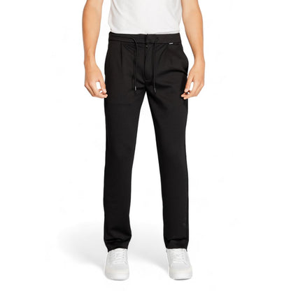 Vaqueros y pantalones de poliéster negro