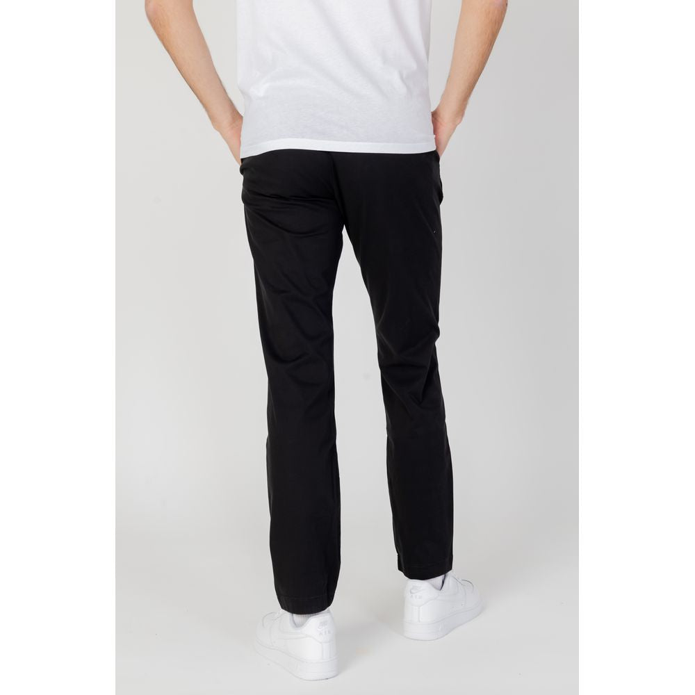 Vaqueros y pantalones de algodón negro