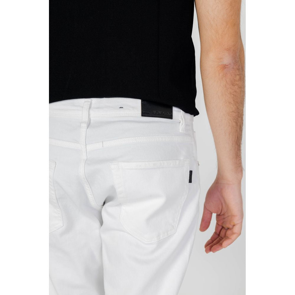 Vaqueros y pantalones de algodón blanco