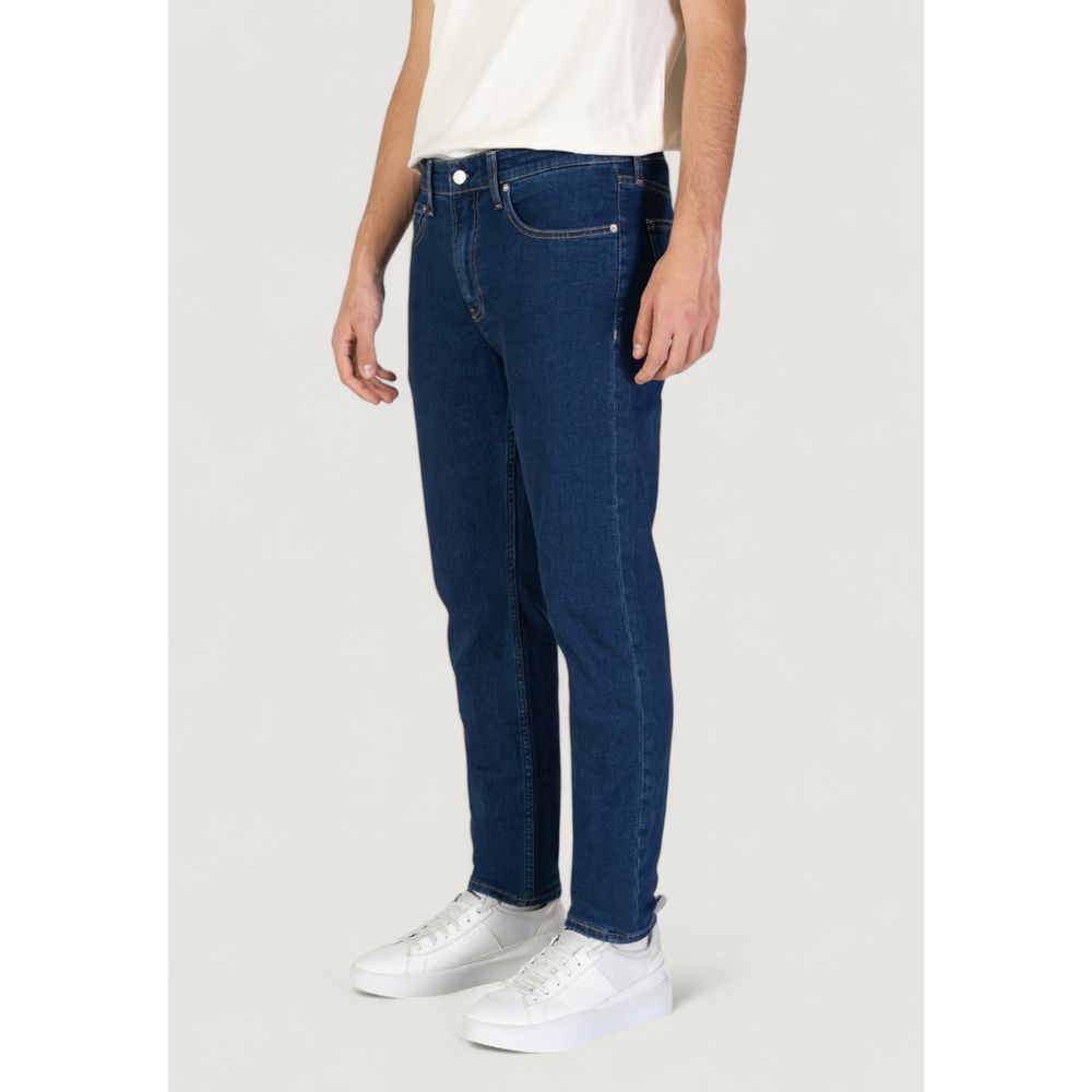 Vaqueros y pantalones de algodón azul