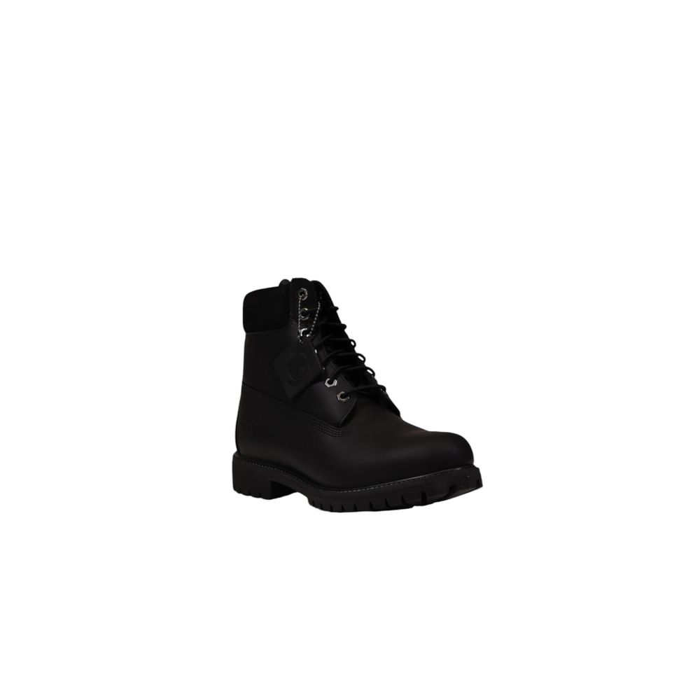 Bota de gamuza negra restauradora con cepillo