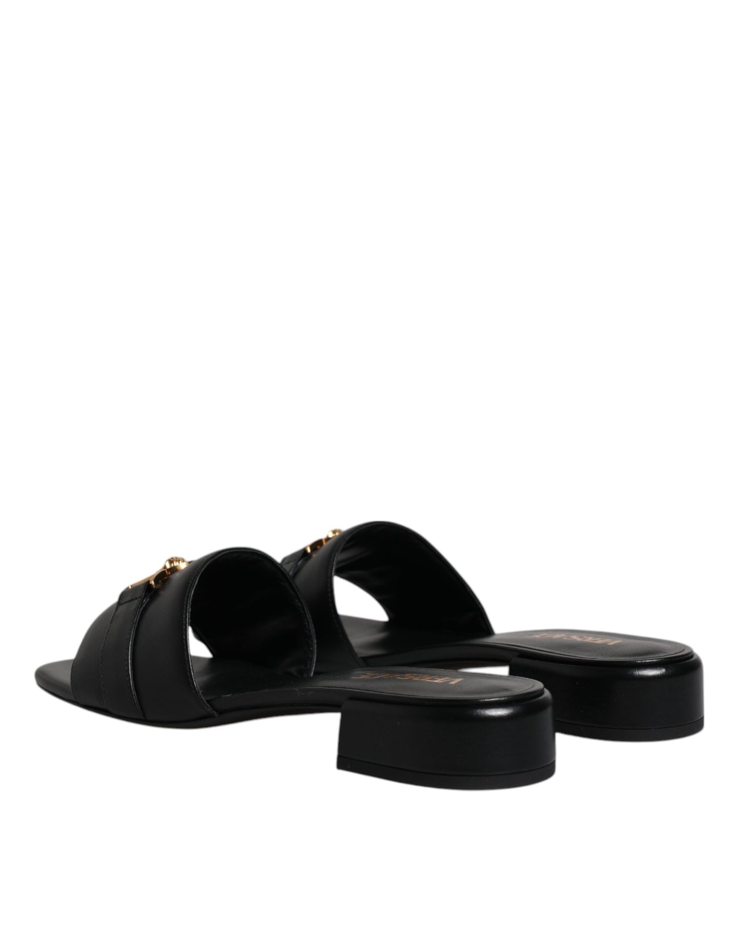 Sandalias planas de cuero negro con placa del logotipo