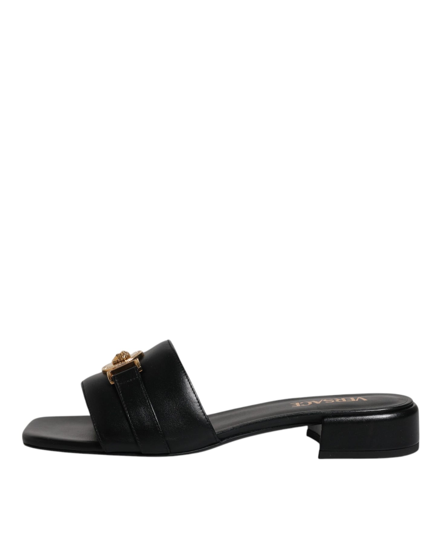 Sandalias planas de cuero negro con placa del logotipo