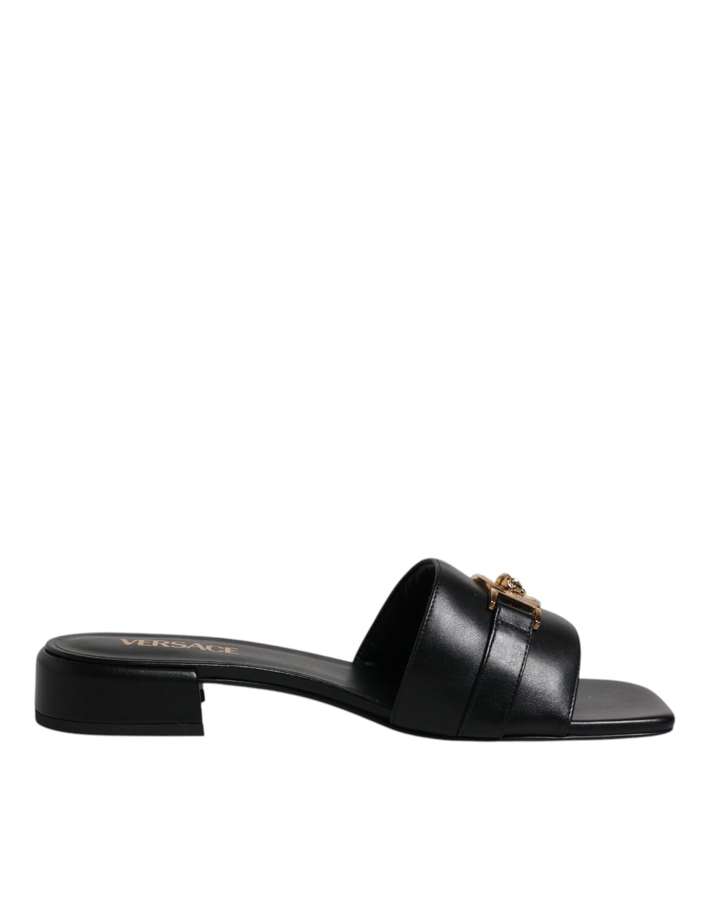 Sandalias planas de cuero negro con placa del logotipo