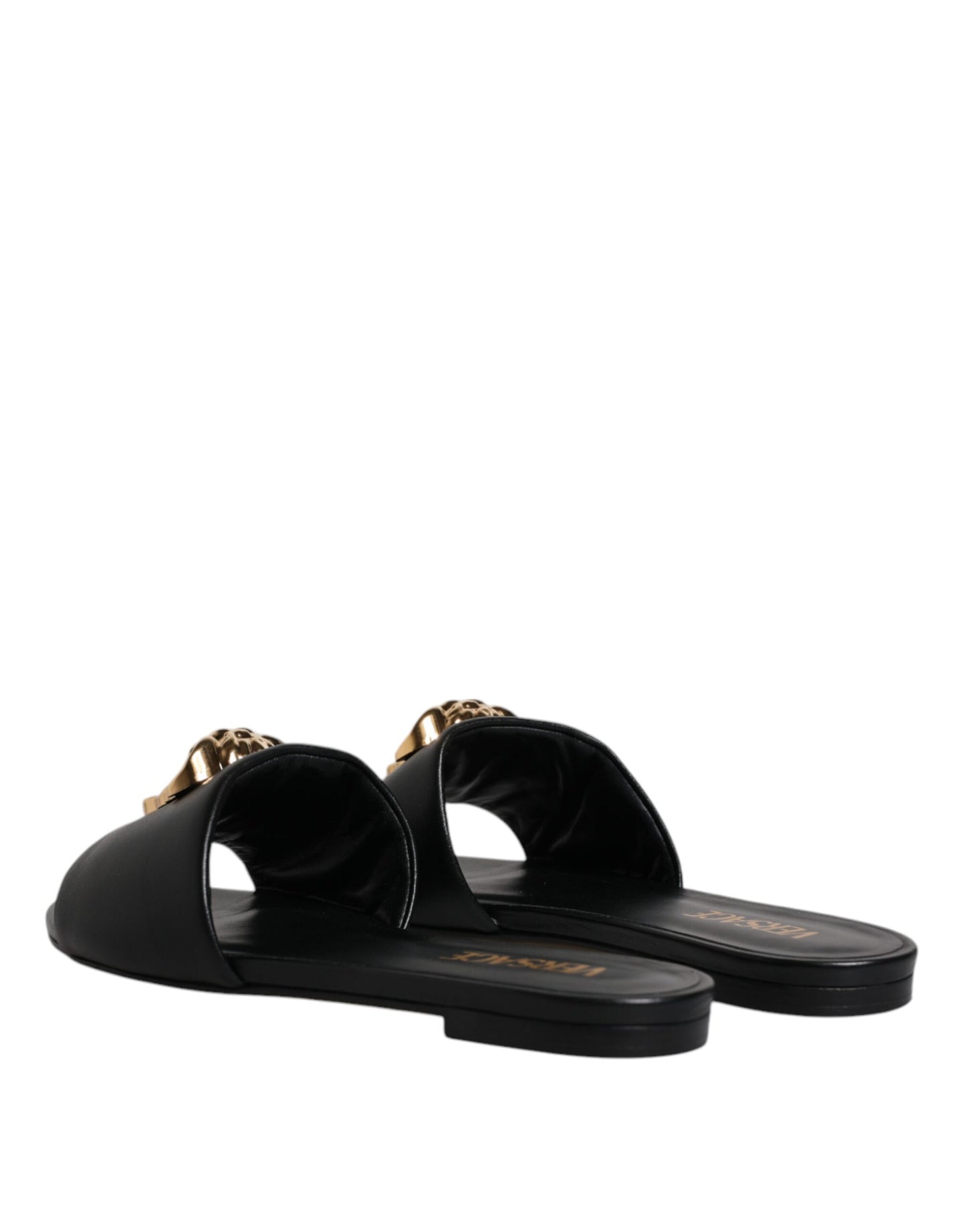 Sandalias planas de cuero negro con placa del logotipo