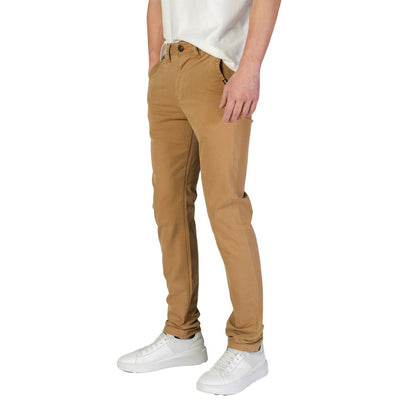 Vaqueros y pantalones de algodón beige