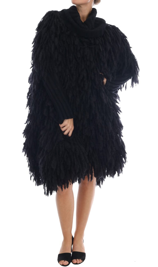 Elegante suéter negro de lana y cachemira con flecos