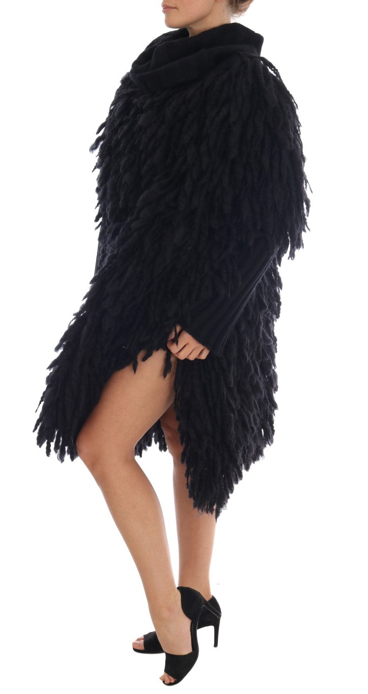 Elegante suéter negro de lana y cachemira con flecos
