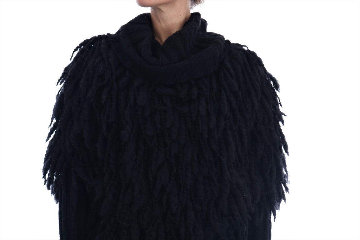 Elegante suéter negro de lana y cachemira con flecos
