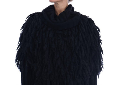 Elegante suéter negro de lana y cachemira con flecos