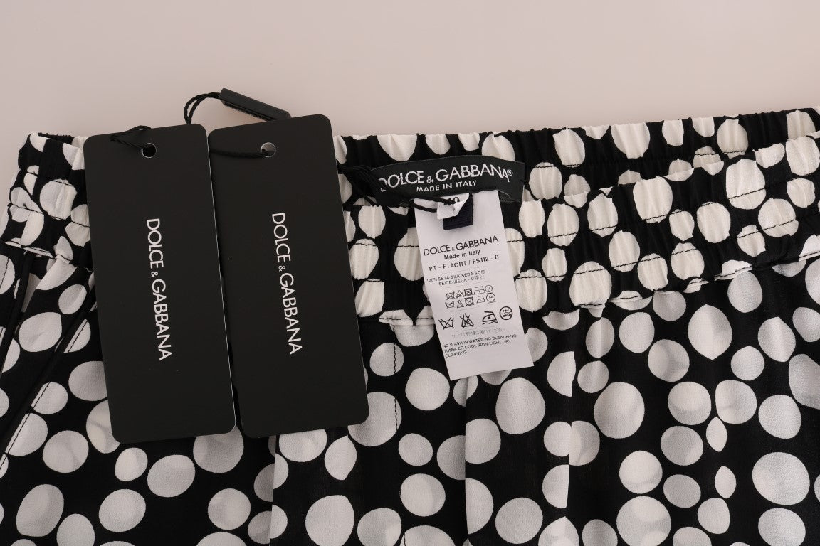 Elegantes pantalones de seda con lunares y cintura alta