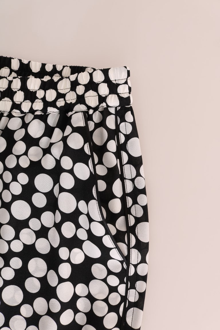 Elegantes pantalones de seda con lunares y cintura alta