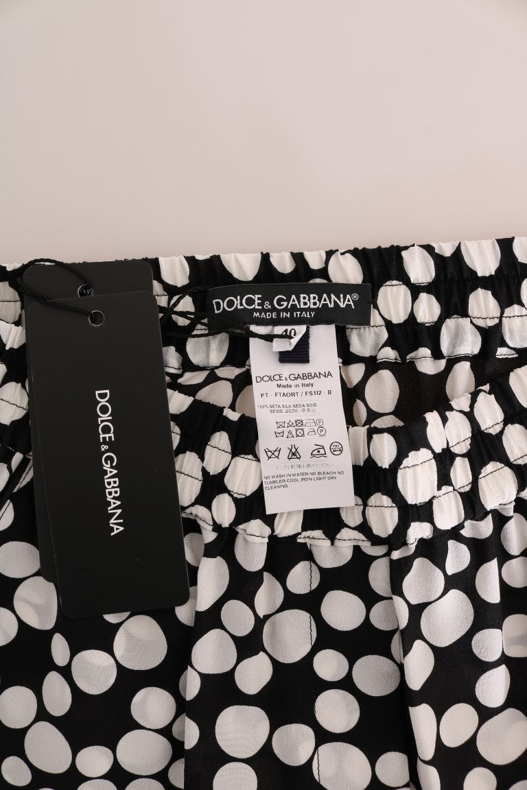 Elegantes pantalones de seda con lunares y cintura alta