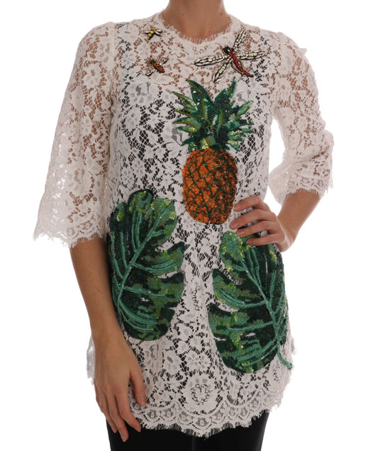 Elegante mini blusa blanca adornada con encaje