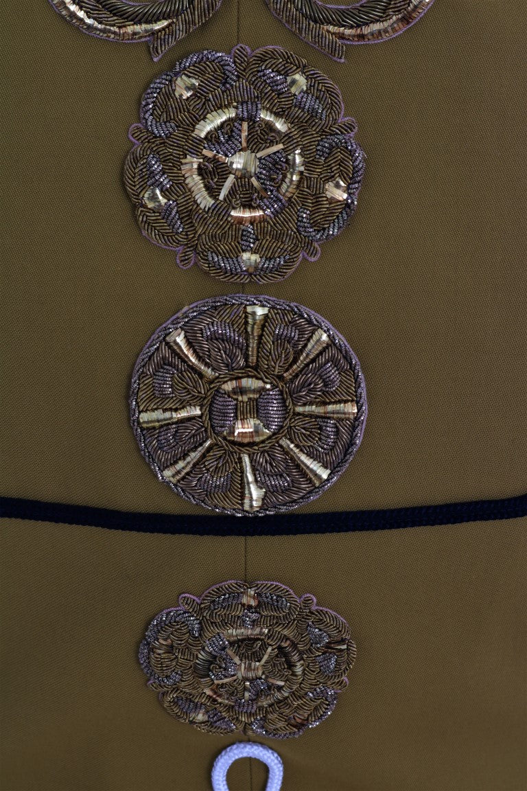 Chaleco con cruz de cristal adornado de pasarela