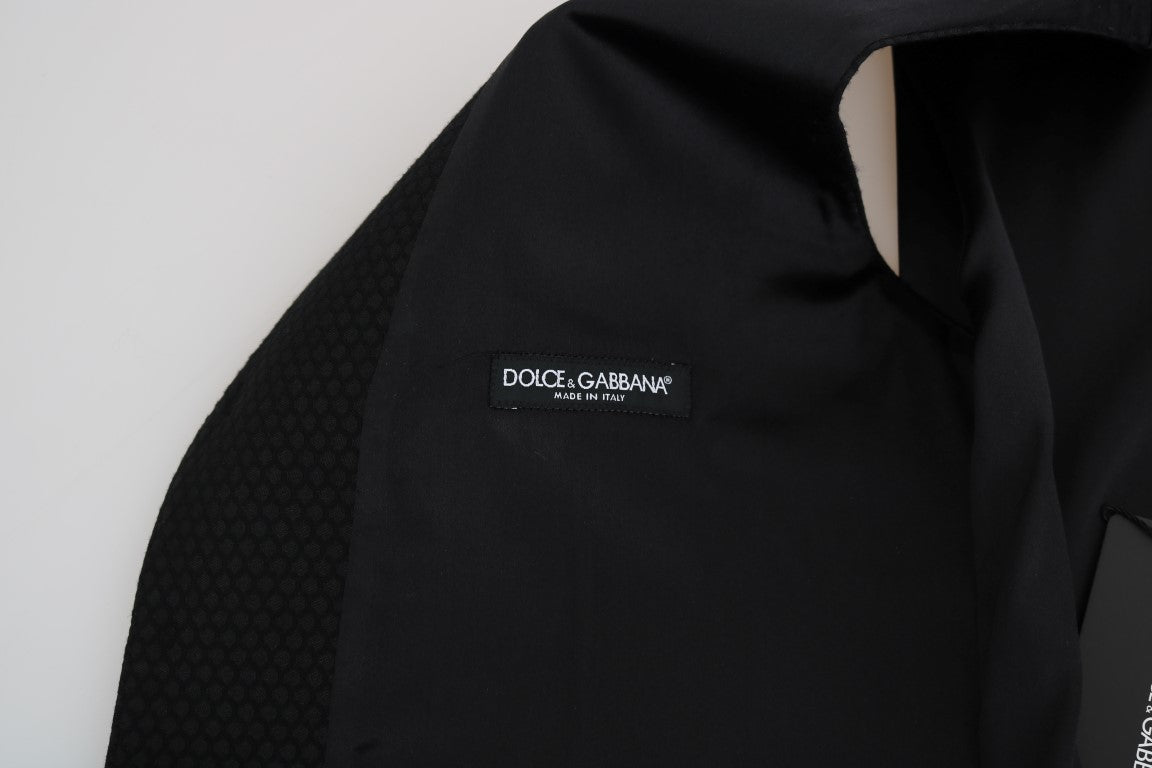 Elegante chaleco de vestir negro con lunares