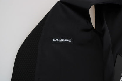 Elegante chaleco de vestir negro con lunares