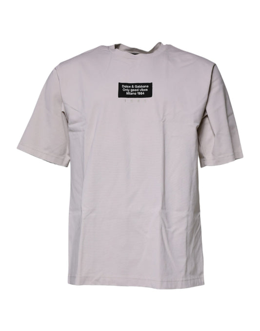 Camiseta beige de manga corta y cuello redondo con logotipo DG