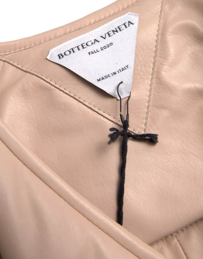 Chaqueta de piel de becerro acolchada sin mangas en beige